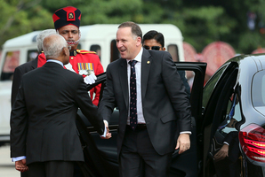 John Key arrives at the opening ceremony of the Commonwealth Heads of Governments meeting. Photo / AP
