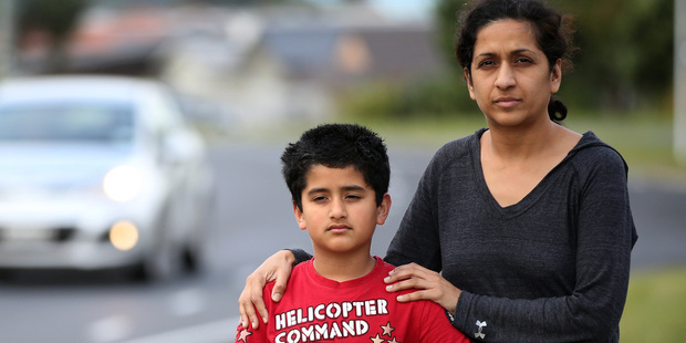 Nimeesha Odedra with her son Shiv want to see a report on their failed bike. Photo / Jason Oxenham