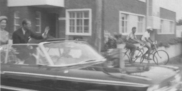 Queen Elizabeth II and Prince Phillip driving along Cameron Road during their visit, 1963.