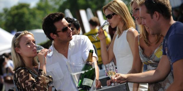 People sample wine at the Taste of Auckland festival.