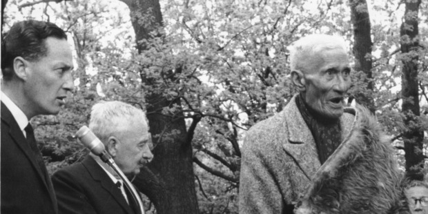 Hugh Kawharu (seen at far left in 1965), embodied the wisdom and mana of tupuna like James Te Hikoi Paora (in cloak) who was a Ngati Whatua rangatira in later life.