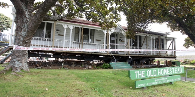The Old Homestead in Pt Chevalier will have to be taken off the truck and put back on its site. Photo / Chris Gorman