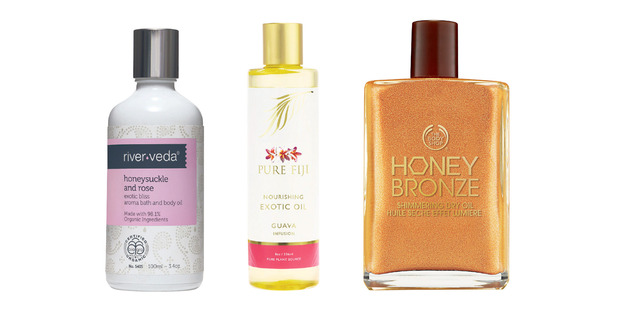 River Veda Honeysuckle and Rose Exotic Bliss Body Oil; Pure Fiji Guava Nourishing Exotic Oil; The Body Shop Honey Bronze Shimmering Dry Oil. Photo / Supplied.