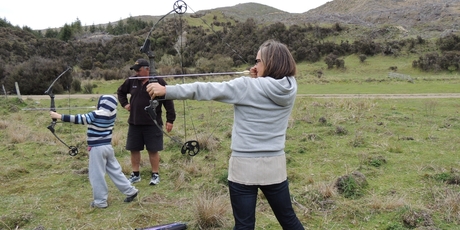 Taking in a spot of archery with Tom Loughlin.