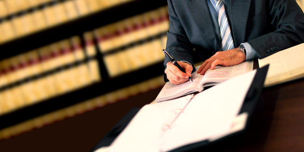 Immigration yesterday confirmed it had 185 advisers or lawyers with "active warning" on its application management system. Photo / Getty Images