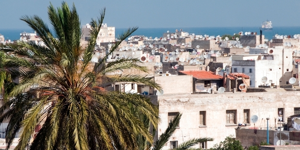 The New Zealander flew with his former wife to Casablanca to meet his new partner.