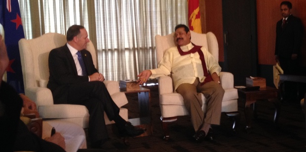 John Key talks with Mahinda Rajapksa. Photo / Claire Trevett