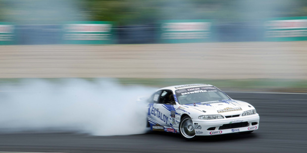 Gaz Whiter smokes the competition at the opening round of D1NZ at Hampton Downs. Picture / Blake Lewis