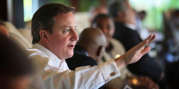 British Prime Minister David Cameron backed carbon emission cuts and suggested there was growing evidence of a link between man-made climate change and disasters. Photo / AP