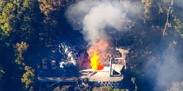 Flames leap from the ventilation shaft at the Pike River Mine in the Paparoa Range. Photo / Mark Mitchell
