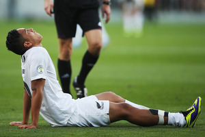 Bill Tuiloma lies down injured during the FIFA World Cup Qualifier match between the All Whites and Mexico at Westpac Stadium. Photo / Getty Images