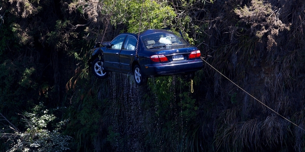 The car involved in the incident on Sunday was lifted from the Waikato River yesterday. Photo / Christine Cornege
