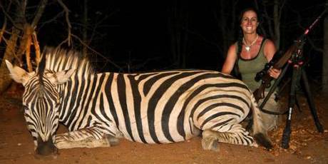 US TV presenter Melissa Bachman poses with a dead zebra in South Africa.