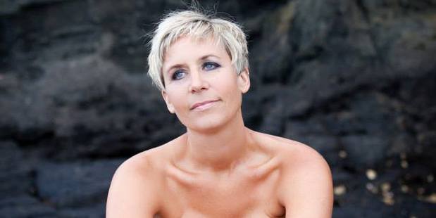 Nic Russell has done a photo shoot showing off her reconstructed breasts.
Photo / Facebook