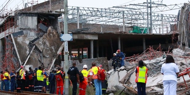 Rescuers search for construction workers still unaccounted for under the rubble at the Tongaat Mall, after a floor collapsed. Photo / AFP