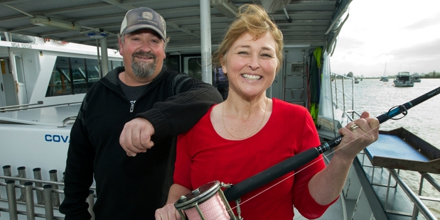 Michelle and Lance Goodhew are an effective team on the water: He's the skipper and she's the angler. Photo / Mark Mitchell