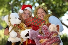 CHEERFUL: Jo Reyngoud (left) and Michele Glogoski, cheer leaders, were well into the spirit of things yesterday with some of the goodies which have come in. PHOTO/ DUNCAN BROWN HBT134526-02 CHEERFUL: Jo Reyngoud (left) and Michele Glogoski, cheer leaders, were well into the spirit of things yesterday with some of the goodies which have come in. PHOTO/ DUNCAN BROWN HBT134526-02