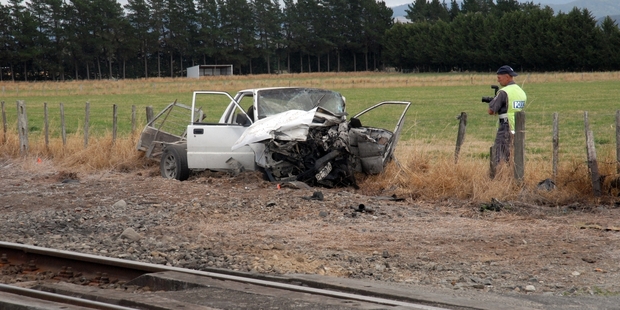 FATAL CRASH: The ute that crashed into the side of a train in Carterton in February.