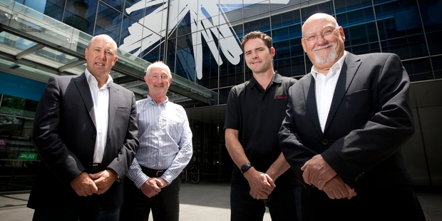 Teaming up are (from left) Telecom's Rod Snodgrass and Chris Bowman with Vigil Wireless Sensor Technologies'
Alan Brannigan and founder Sir Ray Avery. Photo / Natalie Slade