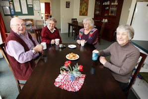 Residents, from left: Tim Holderness, 79, Mary Campbell, 89, Annie Middleton, 82, and Elva Harris, 86, enjoy a cup of tea in the shared kitchen/dining area. Photo / Christine Cornege