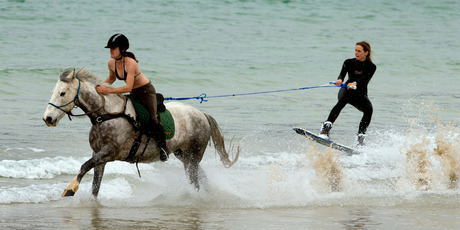 Chloe Phillips-Harris and her horse Fern tow wakeboarder Nikita Osborne at high speed at Matauri Bay.