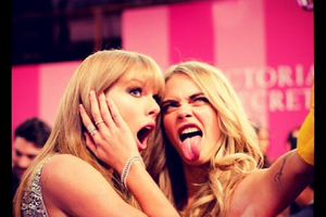 Model Cara Delevingne, right, poses with pop singer Taylor Swift. Photo / Supplied.
