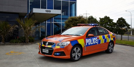 The new red and orange police road safety cars which will patrol New Zealand roads throughout summer.