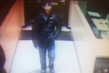CCTV footage of the suspect in the carjacking.