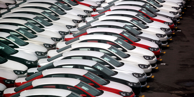 In this Sept. 19, 2013 photo, cars produced in Mexico for export are parked at the port terminal in the Gulf city of Veracruz, Mexico. Photo / AP