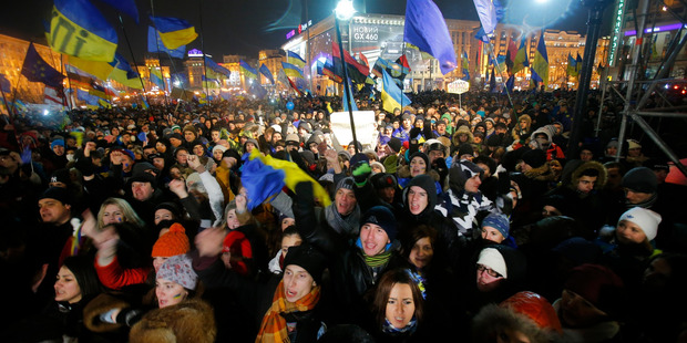 Demonstrators take to the streets in support of Ukraine's integration with the European Union in the center of Kiev, Ukraine. Photo / AP