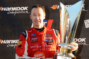 Greg Murphy on the podium at the V8 SuperTourers round in Taupo . Photo / Supplied