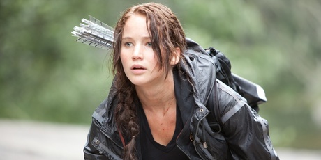 Jennifer Lawrence as Katniss, a role model for a new generation of young women.