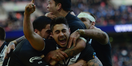 Shaun Johnson of New Zealand celebrates his winning try with team mates during the Rugby League World Cup Semi Final match between New Zealand and England. Photo / Getty Images.