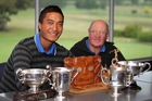 Josh Dasent (left) and Grant Dasent, his grandfather and part-time caddy, eye up the trophies which will be up for grabs at next week's Hawke's Bay Maori tournament. Photo/Duncan Brown. Josh Dasent (left) and Grant Dasent, his grandfather and part-time caddy, eye up the trophies which will be up for grabs at next week's Hawke's Bay Maori tournament. Photo/Duncan Brown.