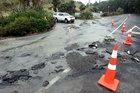 Flood water washed away a section of Kaimata Rd near Bay View last night. Photo/Paul Taylor. Flood water washed away a section of Kaimata Rd near Bay View last night. Photo/Paul Taylor.
