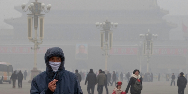 Beijing has pledged to reduce pollution by 2017 but the number of vehicles is growing and alternatives to coal for energy are some way off. Photo / AP