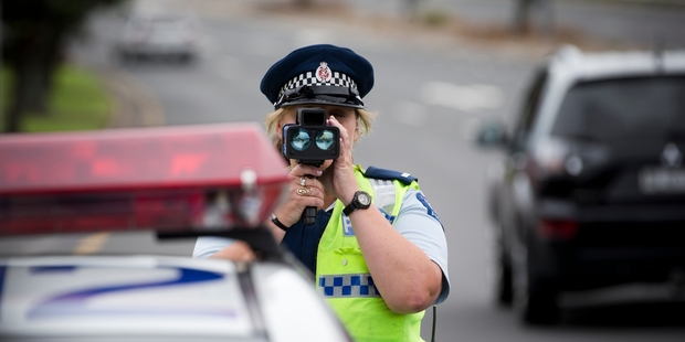 Constable Jackie Pearce stopped five drivers within 30 minutes along Quay Street yesterday, all over the new 4km/h speed threshold. Photo / Greg Bowker