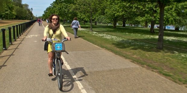 Cycling through Hyde Park.