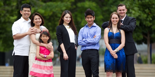 From left, new citizens Marlon and Maida Macatual with daughter Maive, from the Philippines, Cecilia Liu from China, Patamyai Hla from Burma and Sherene Marais and Gareth Poley from South Africa. Photo / Richard Robinson