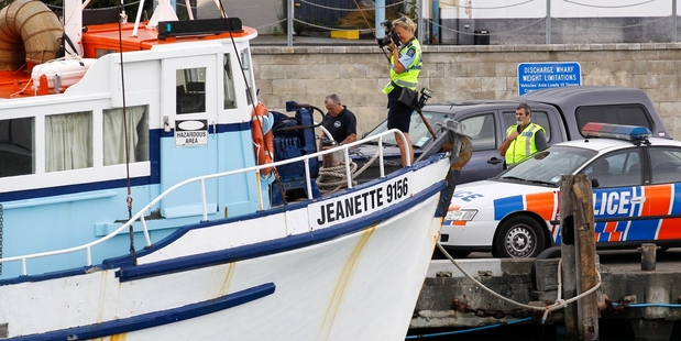 Police investigate the death. Photo / John Cowpland