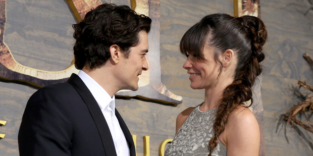 Orlando Bloom, left, and Evangeline Lilly arrive at the Los Angeles premiere of The Hobbit: The Desolation of Smaug in Los Angeles. Photo / AP
