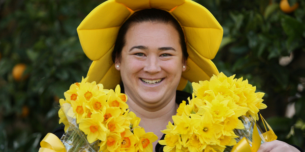 Daffodil Day Coordinator Jo McIntosh is all ready for the big day on Friday. Photo: Mark McKeown. BOP 31Aug12 - DAFFODIL DELIGHT: Bright yellow flowers, smiling volunteers and the jingle of coins