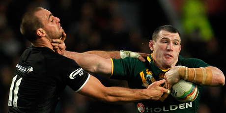 Paul Gallen (R) of Australia is tackled by Simon Mannering of New Zealand during the Rugby League World Cup final between New Zealand and Australia. Photo / Getty Images.