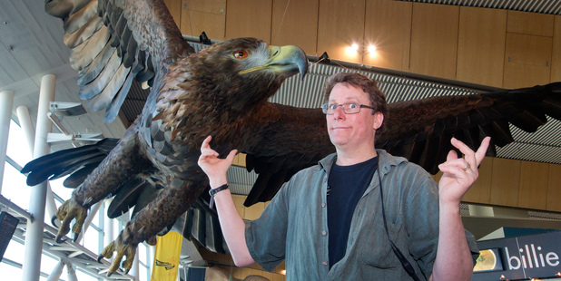 Richard Taylor with one of the giant great eagles created by Weta Workshop and installed at Wellington International Airport. Photo / Mark Mitchell