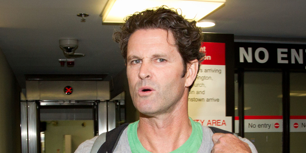 Chris Cairns arrives at the Auckland Domestic Airport. Photo / Richard Robinson