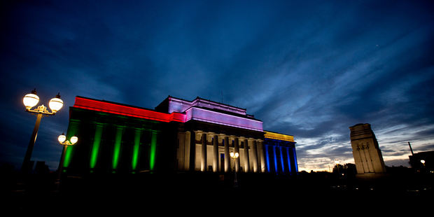 The Auckland War Memorial Museum lit in the colours of the South African flag as a tribute to Nelson Mandela. Photo / Dean Purcell.