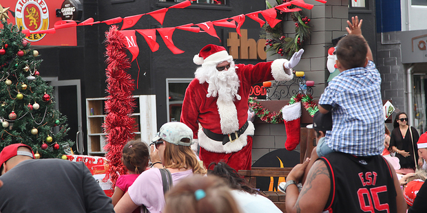Santa was as popular as ever at the Mount Maunganui Santa Parade. Photo/Andrew Warner.