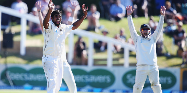 Leg spinner Ish Sodhi (left) of New Zealand managed to remove Shane Shillingford with a googly. Photo / Getty Images