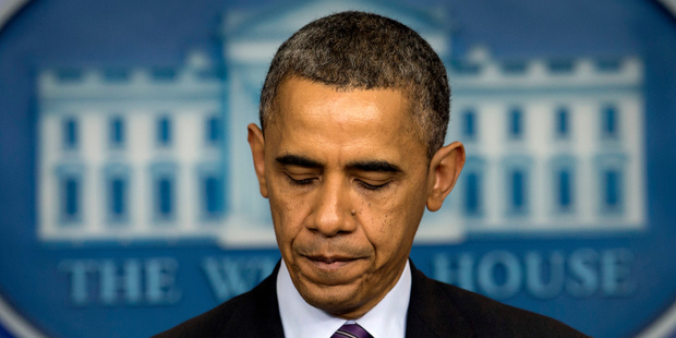 President Barack Obama pauses as he speaks in the briefing room of the White House in Washington. Photo / AP