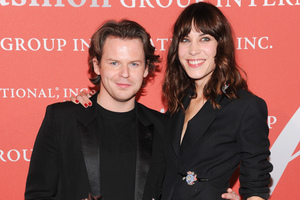 Christopher Kane, winner of British Designer of the Year, with Alexa Chung.
